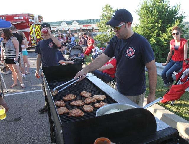 Captain Fanelli on the grill! Photo's courtesy of Frank Becerra.